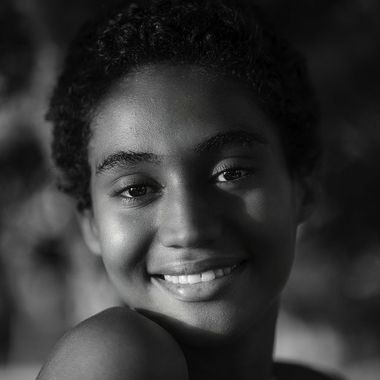 Black-and-white portrait with sculpted light
