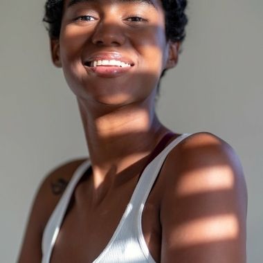 Portrait in a striking pattern of natural light